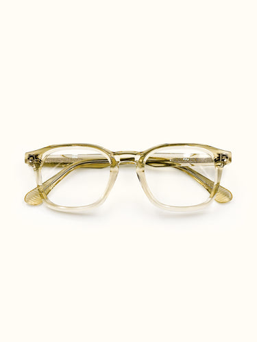 Gold-framed eyeglasses on a white background